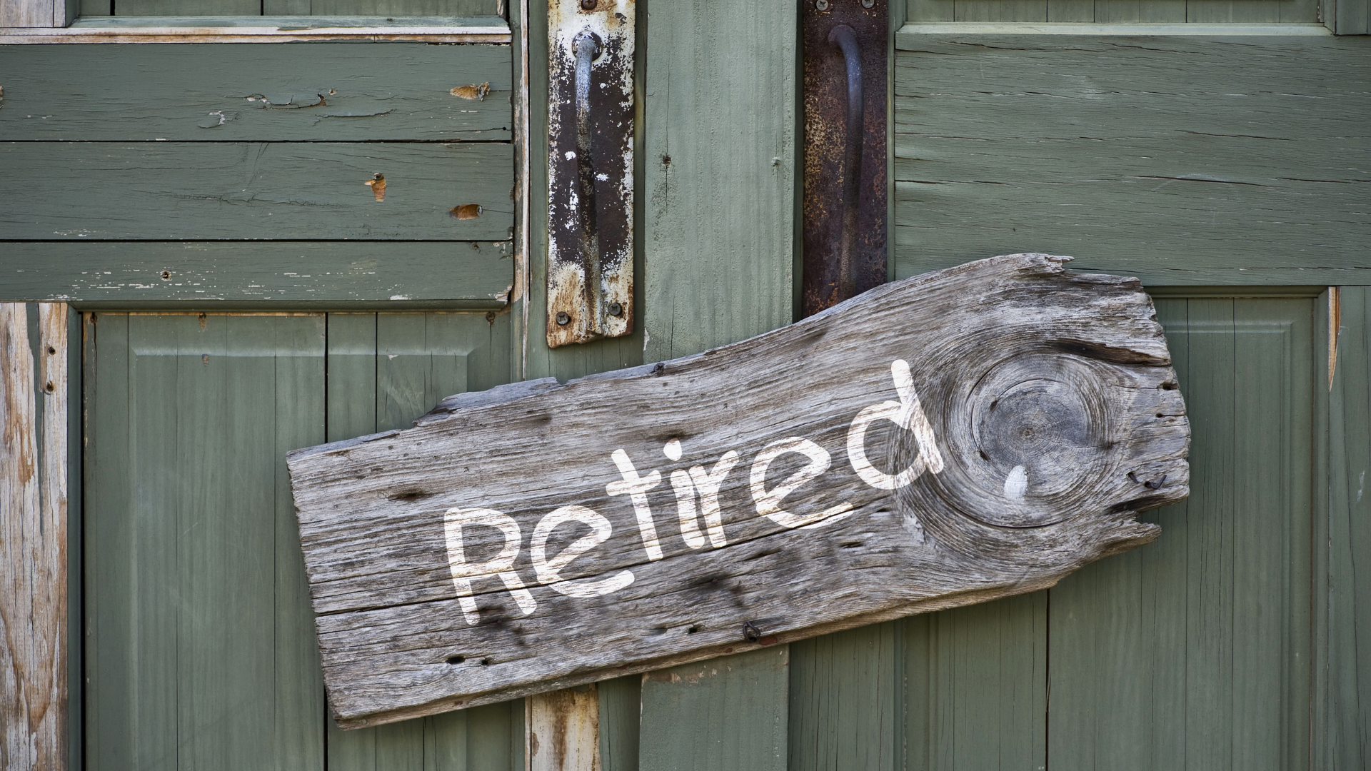Image of retired written on wood